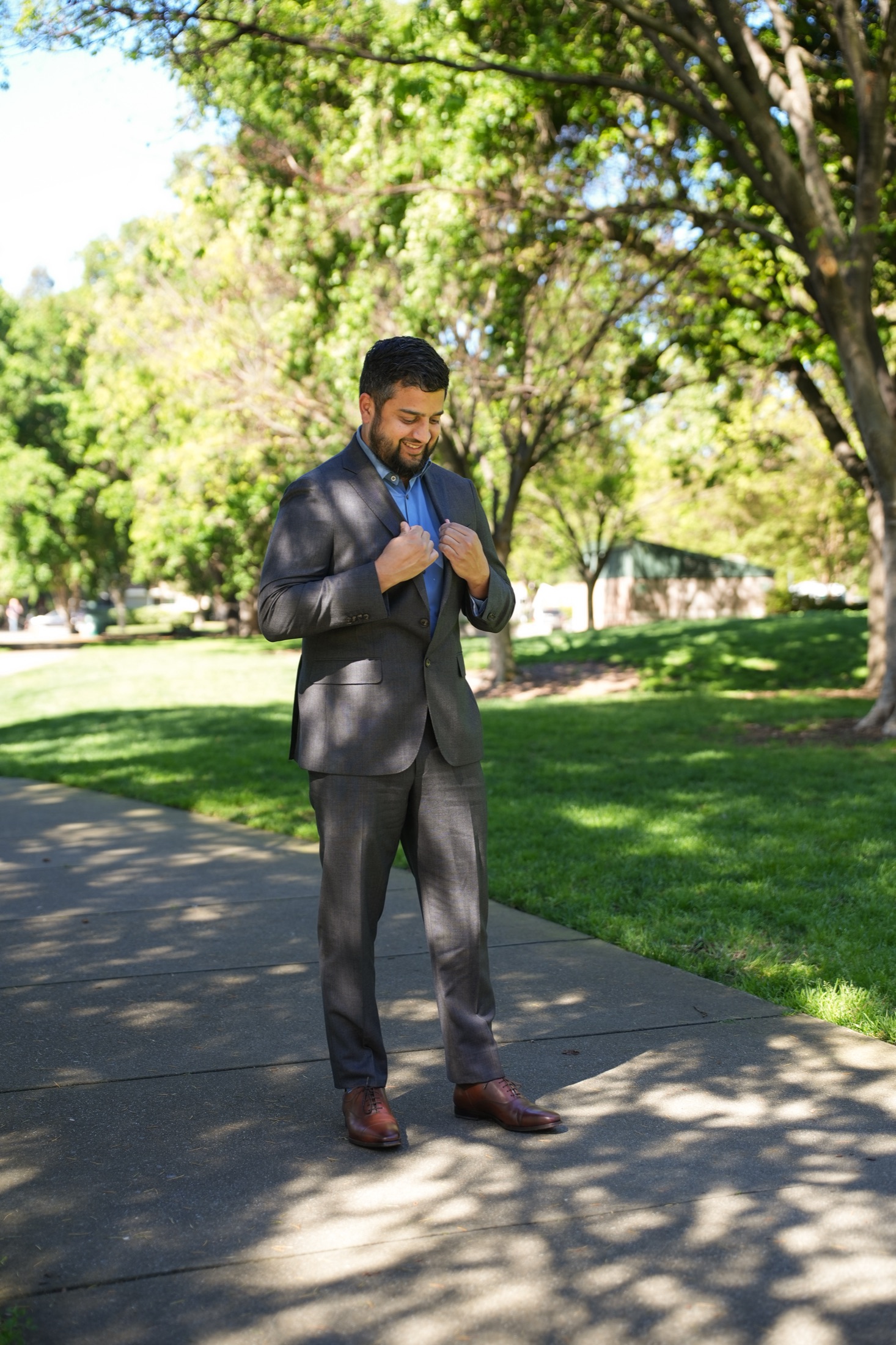 Muzamil Khan on a tree-lined East Bay sidewalk